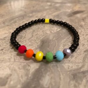 6”-6 1/4”wrist. 6mm Rainbow crystal 4mm black pearl glass bead stretch bracelet.